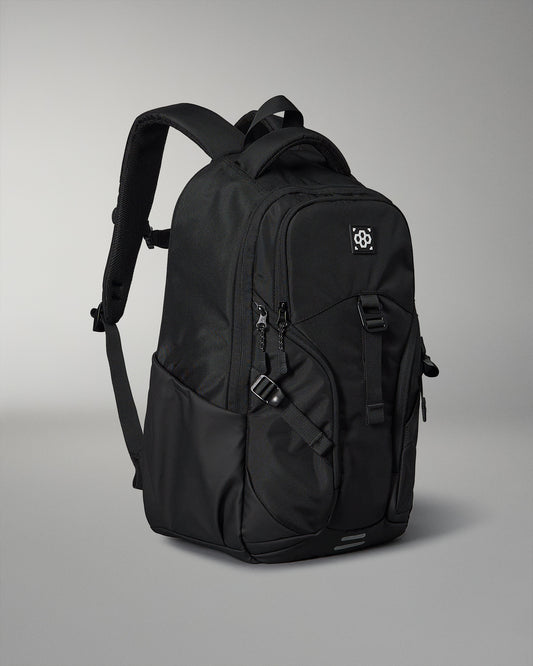Black backpack with a brand logo on a gray background