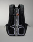 Black backpack with visible branding on a gray background