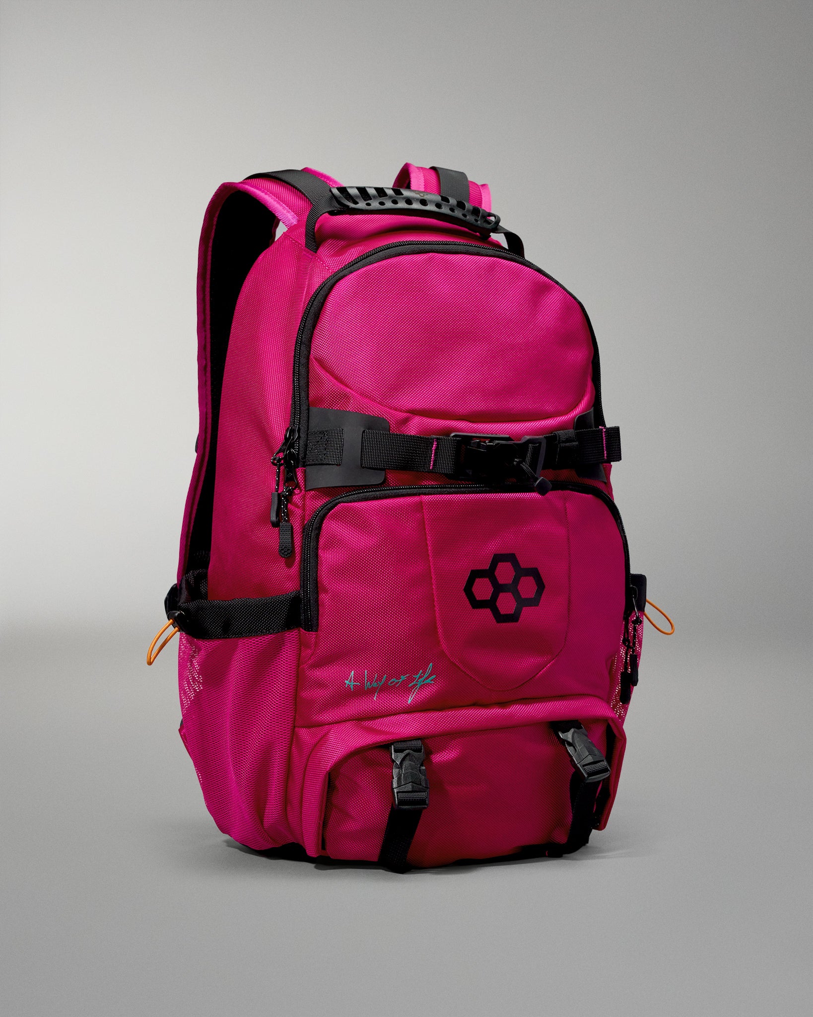 Pink backpack with black straps on a gray background