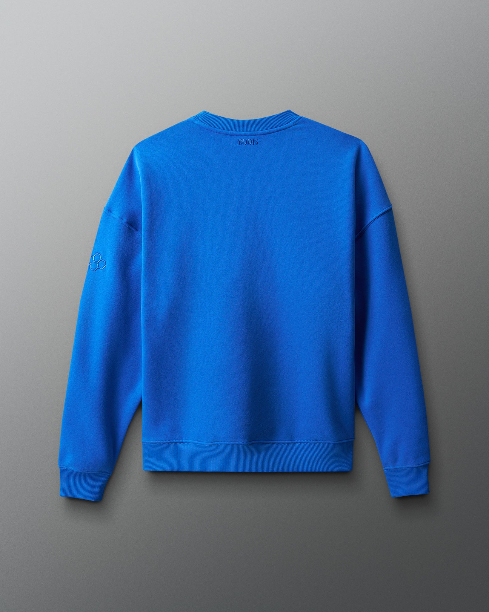 Blue sweatshirt on a gray background