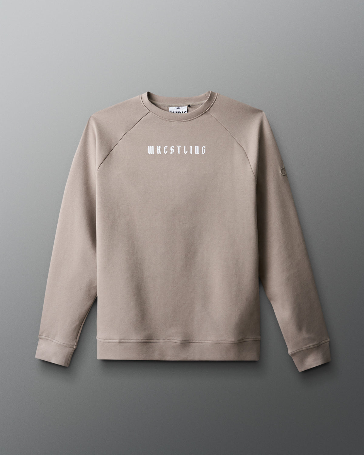 Beige sweatshirt with 'Wrestling' text on a gray background