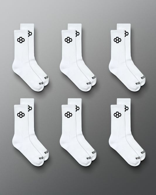 RUDIS Essential Hex Cushion Crew Socks 6-pack in white, featuring black RUDIS Hex logos at the crew and RUDIS branding at the toe.