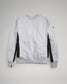 A stylish gray sweatshirt featuring black side panels and a casual design perfect for everyday wear