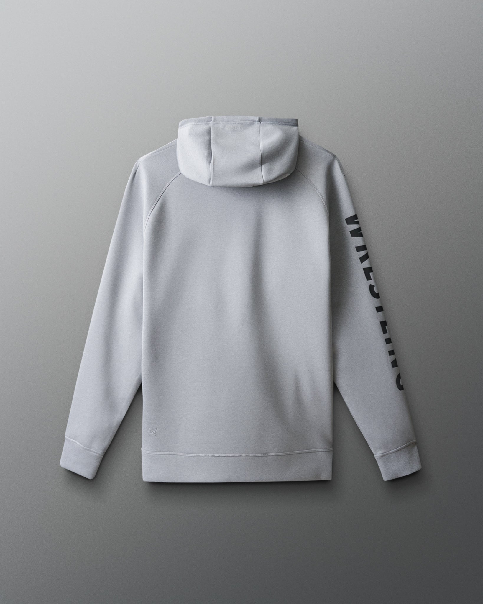 Gray hoodie with branding on sleeve against a gray background