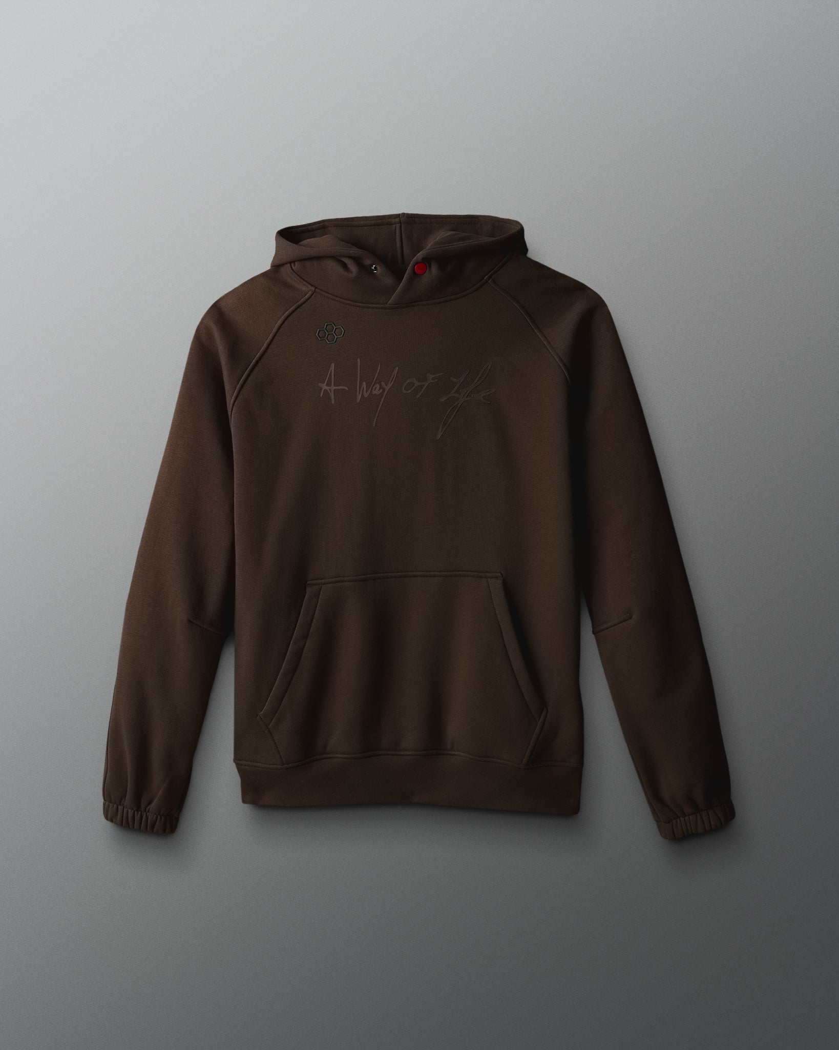 Front view of the RUDIS A Way Of Life Tech Fleece Hoodie in bark brown, featuring tonal A Way Of Life script across the chest, a small RUDIS emblem, kangaroo pocket, and elastic cuffs.