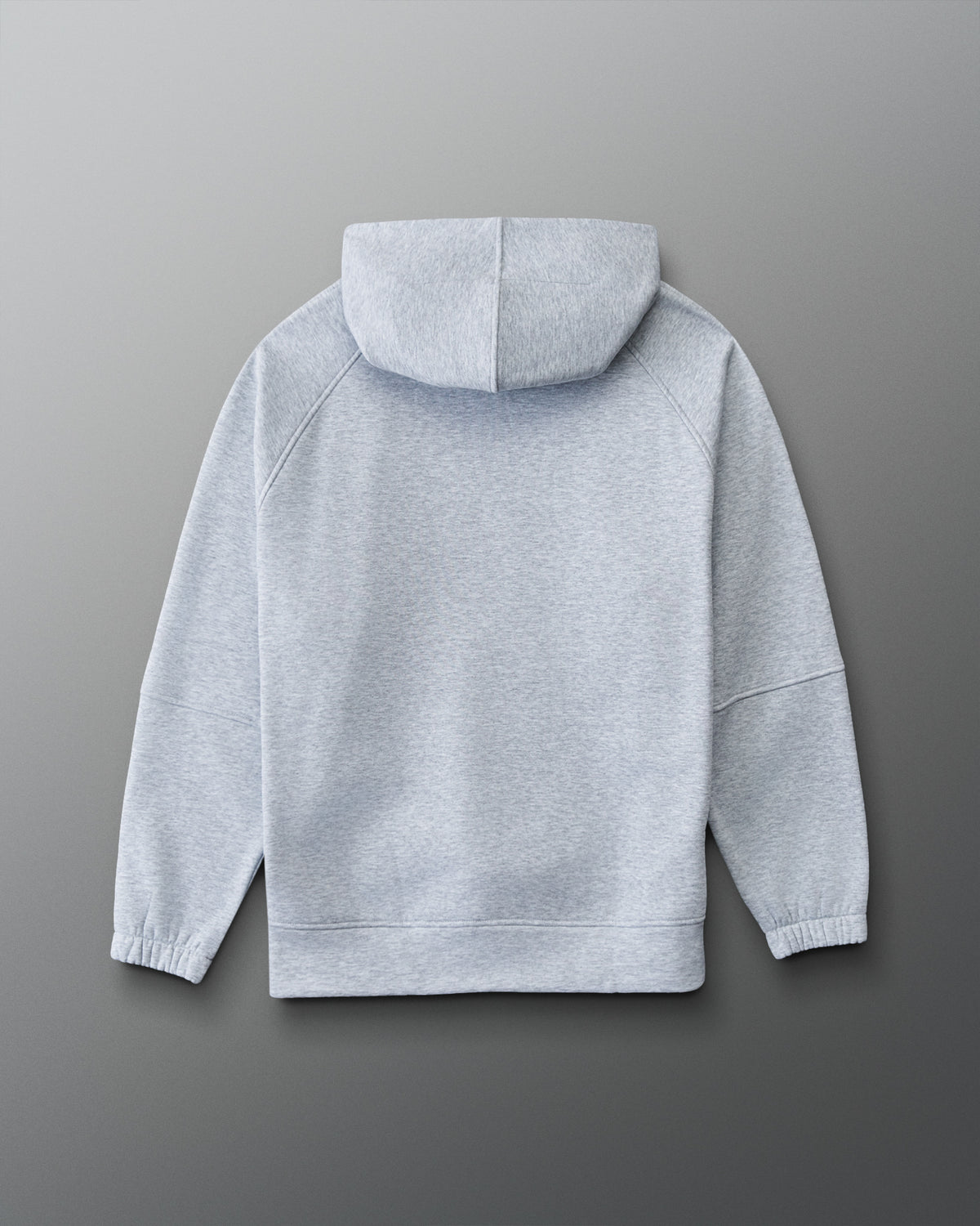 A light gray heather pullover hoodie shown from the back, laid flat against a dark gray gradient background.