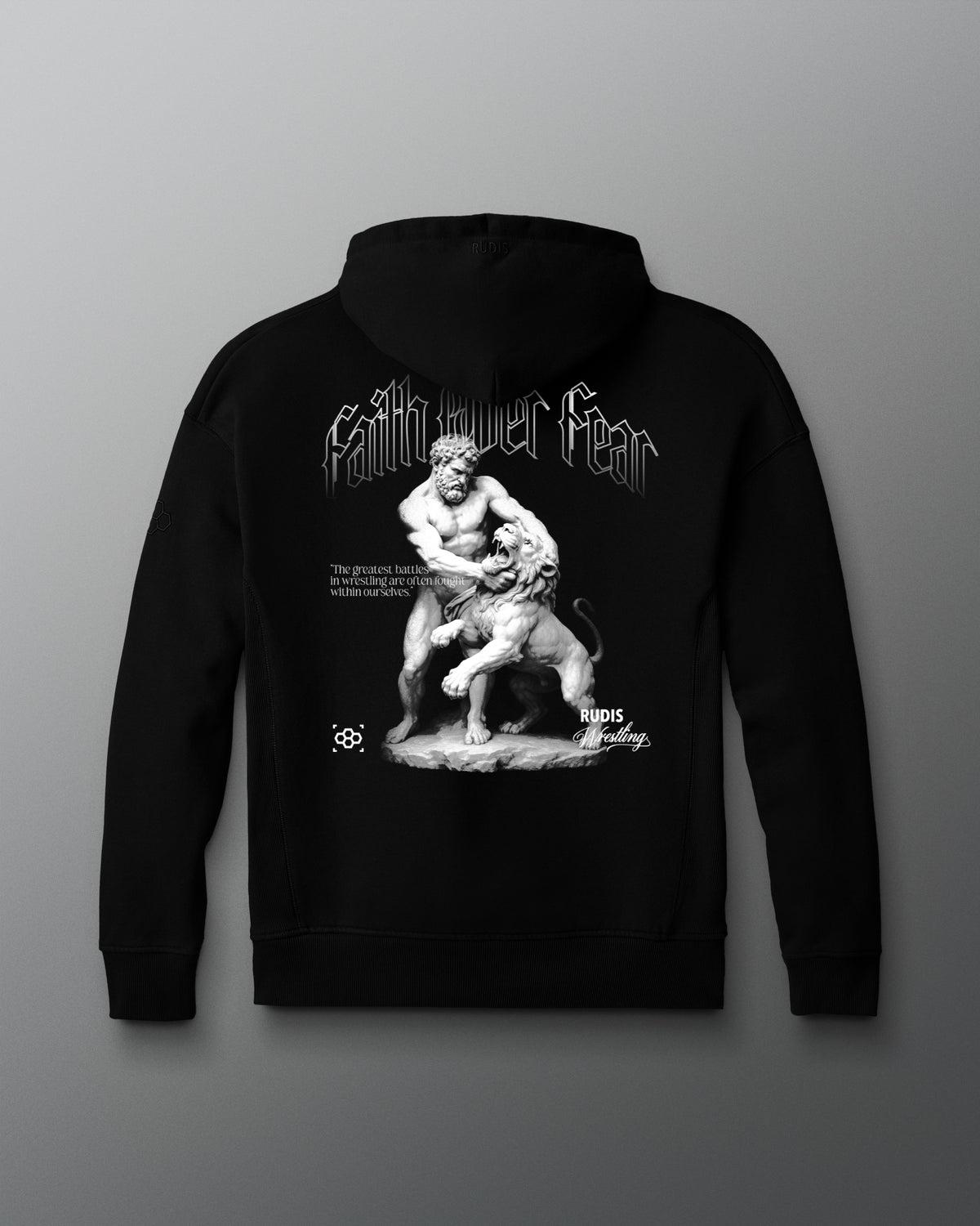 Black hoodie with a graphic design on the back against a gray background