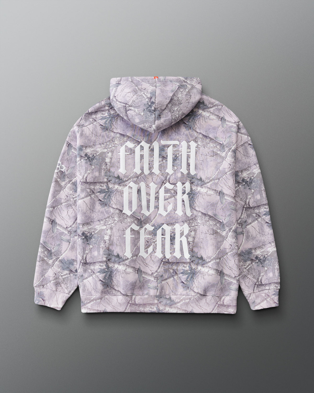 Back view of the RUDIS Faith Over Fear Relaxed Comfort Fleece Hoodie in Tree Camo, featuring bold white Faith Over Fear lettering across the back and an allover woodland camouflage print.