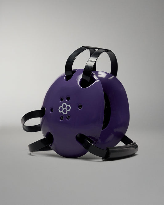 Purple Wrestling Headgear with black straps. features RUDIS logo