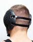 Person wearing black RUDIS Airflow wrestling headgear ear protection