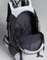 A sleek black and white multifunctional backpack featuring a spacious interior and various compartments for organization