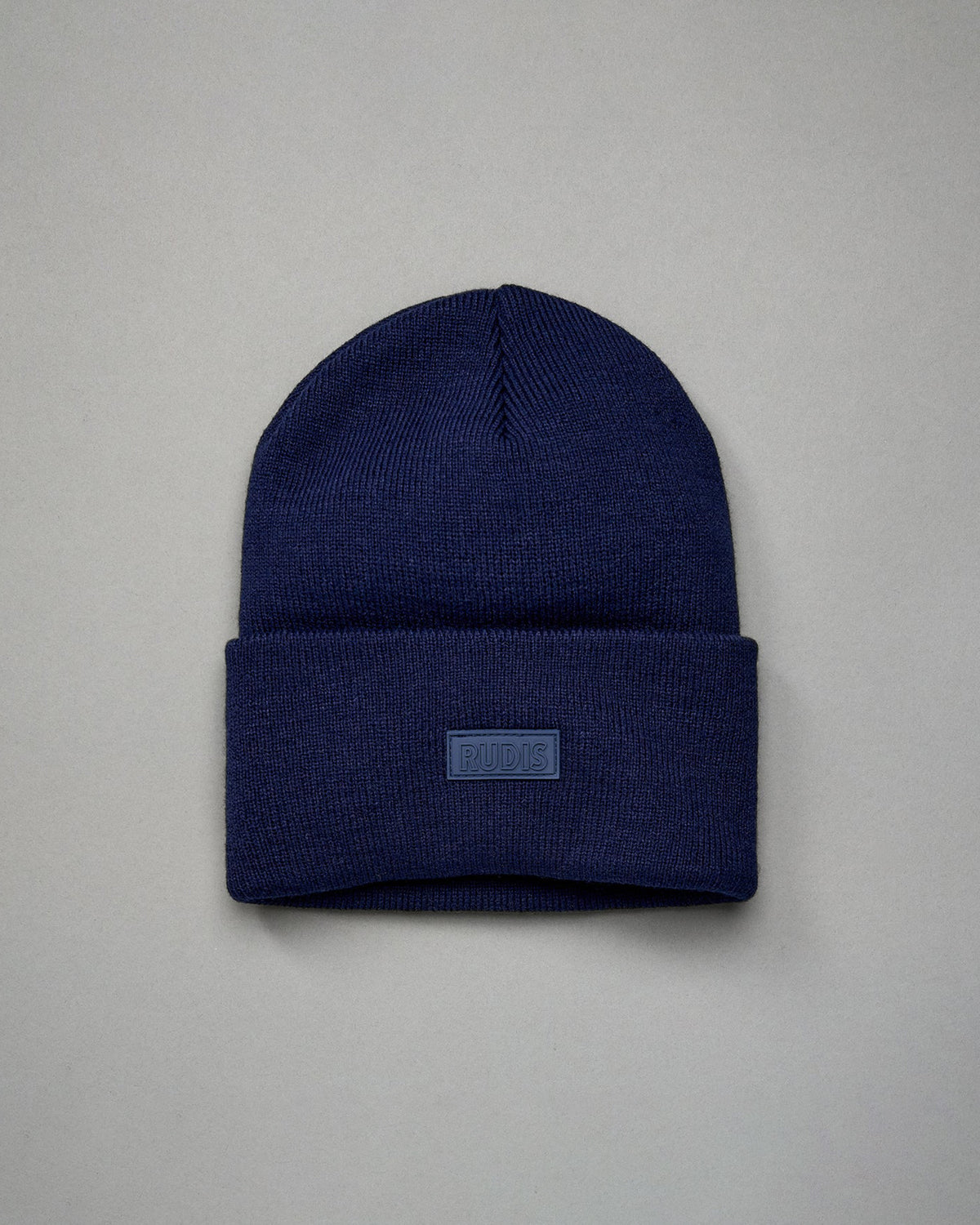 Bonnet à rabat avec patch en silicone RUDIS