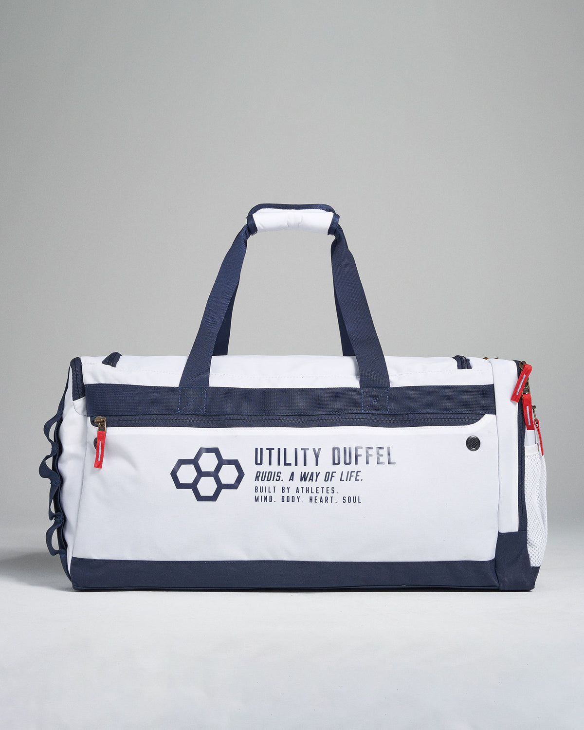 A durable white and navy utility duffel bag featuring a modern design marked with branding and built for versatility