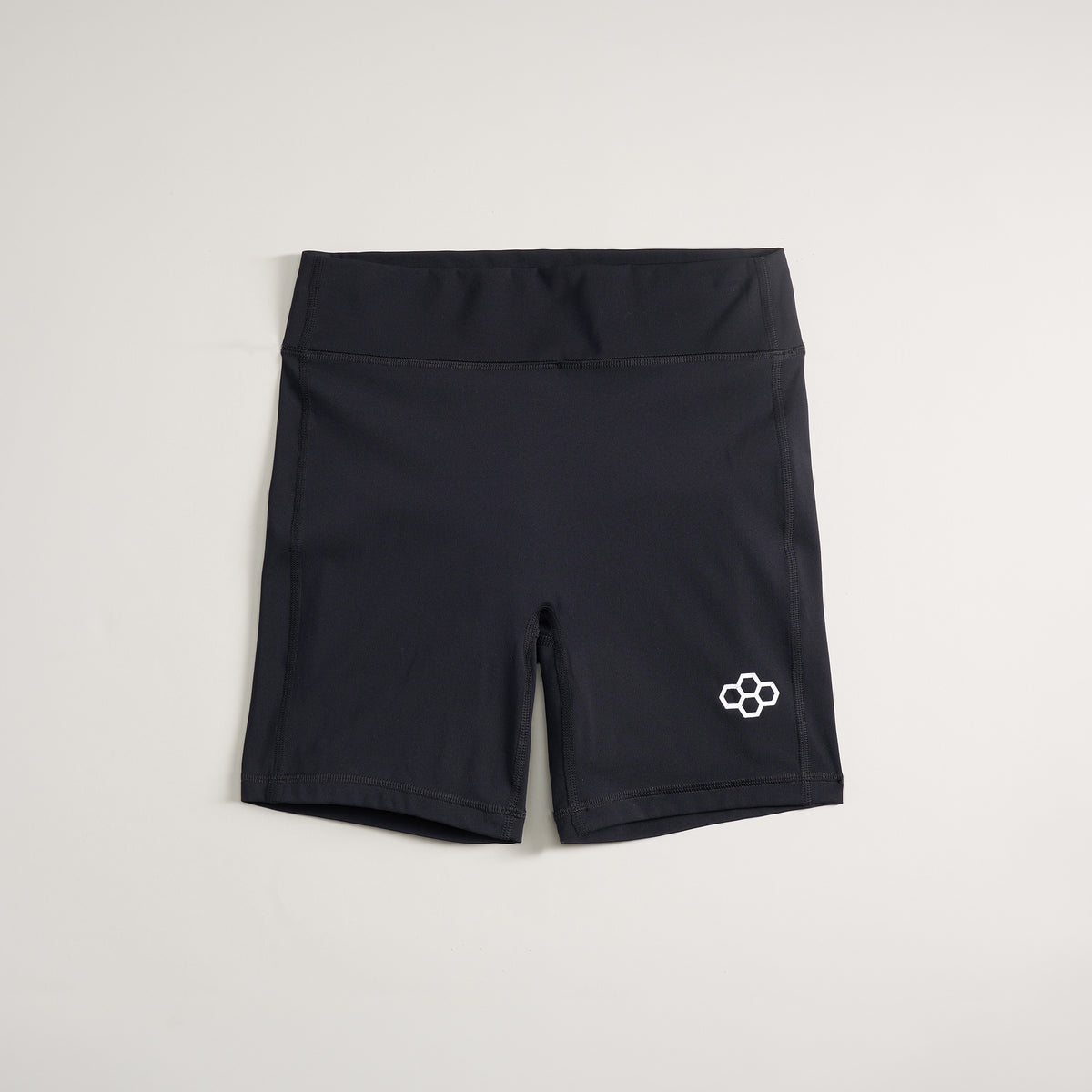 This image features a pair of black athletic shorts designed for comfort and performance showcasing a sleek fit and subtle logo detail