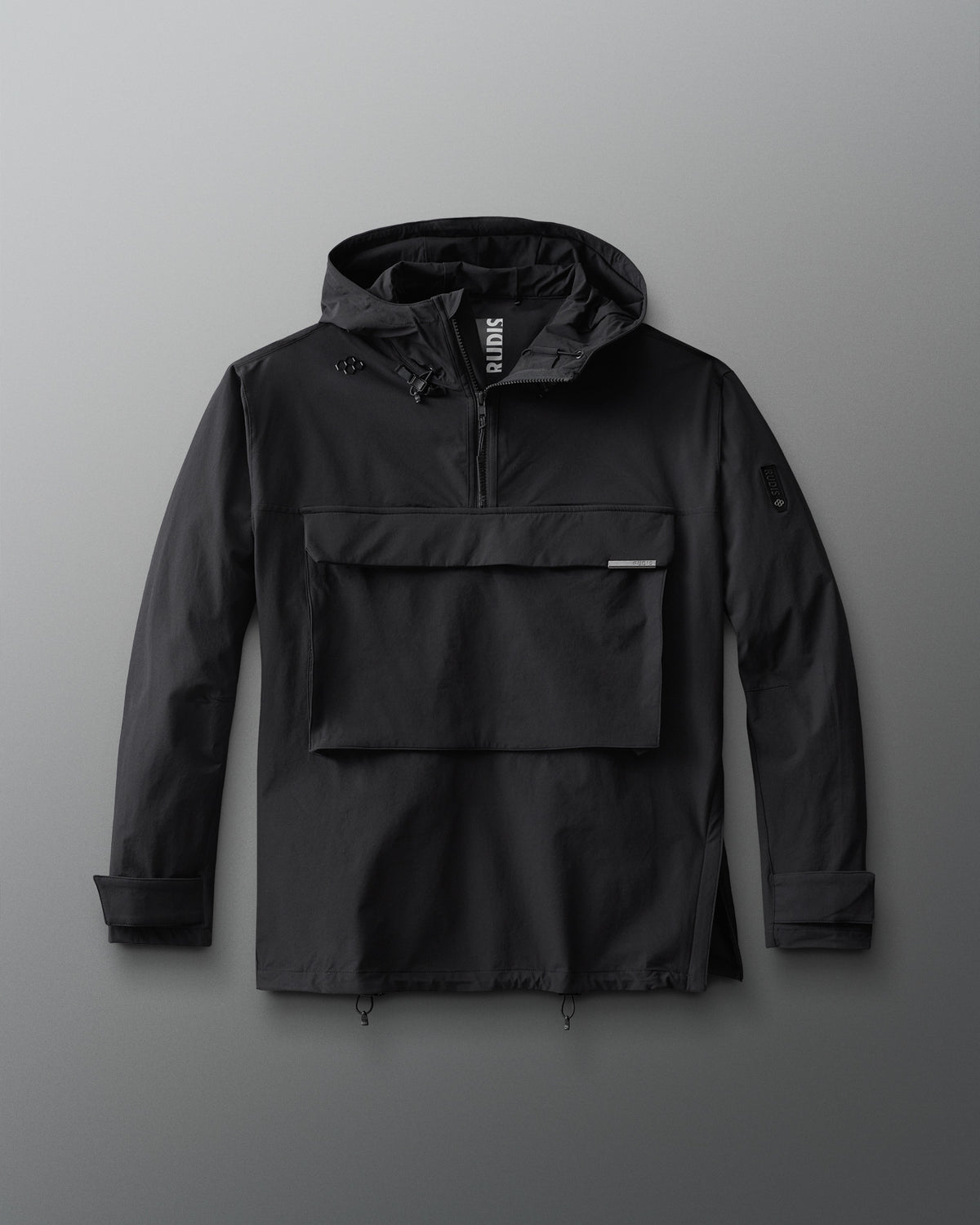 A black 1/4 zip windbreaker jacket with a hood and front gear pocket.