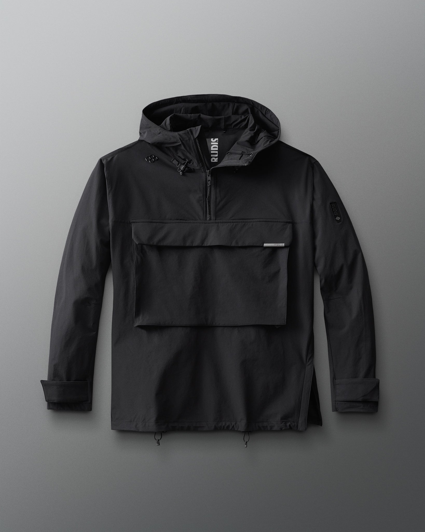 A black 1/4 zip windbreaker jacket with a hood and front gear pocket.