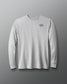 Front view of the RUDIS Essential Hex Elite Super Soft Long Sleeve T-Shirt in heather gray, featuring a dark gray RUDIS hex logo on the left chest, classic crew neckline, and ribbed cuffs.