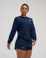 Female athlete wearing the navy RUDIS Essential Hex Elite Super Soft Long Sleeve T-Shirt with white Hex chest logo.