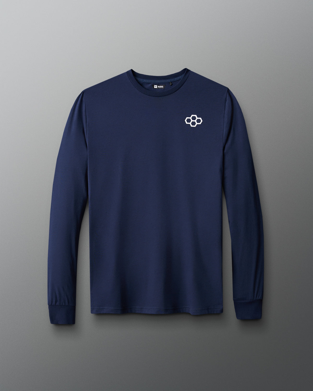Front view of the RUDIS Essential Hex Elite Super Soft Long Sleeve T-Shirt in navy blue, featuring a white RUDIS hex logo on the left chest, classic crew neckline, and ribbed cuffs.