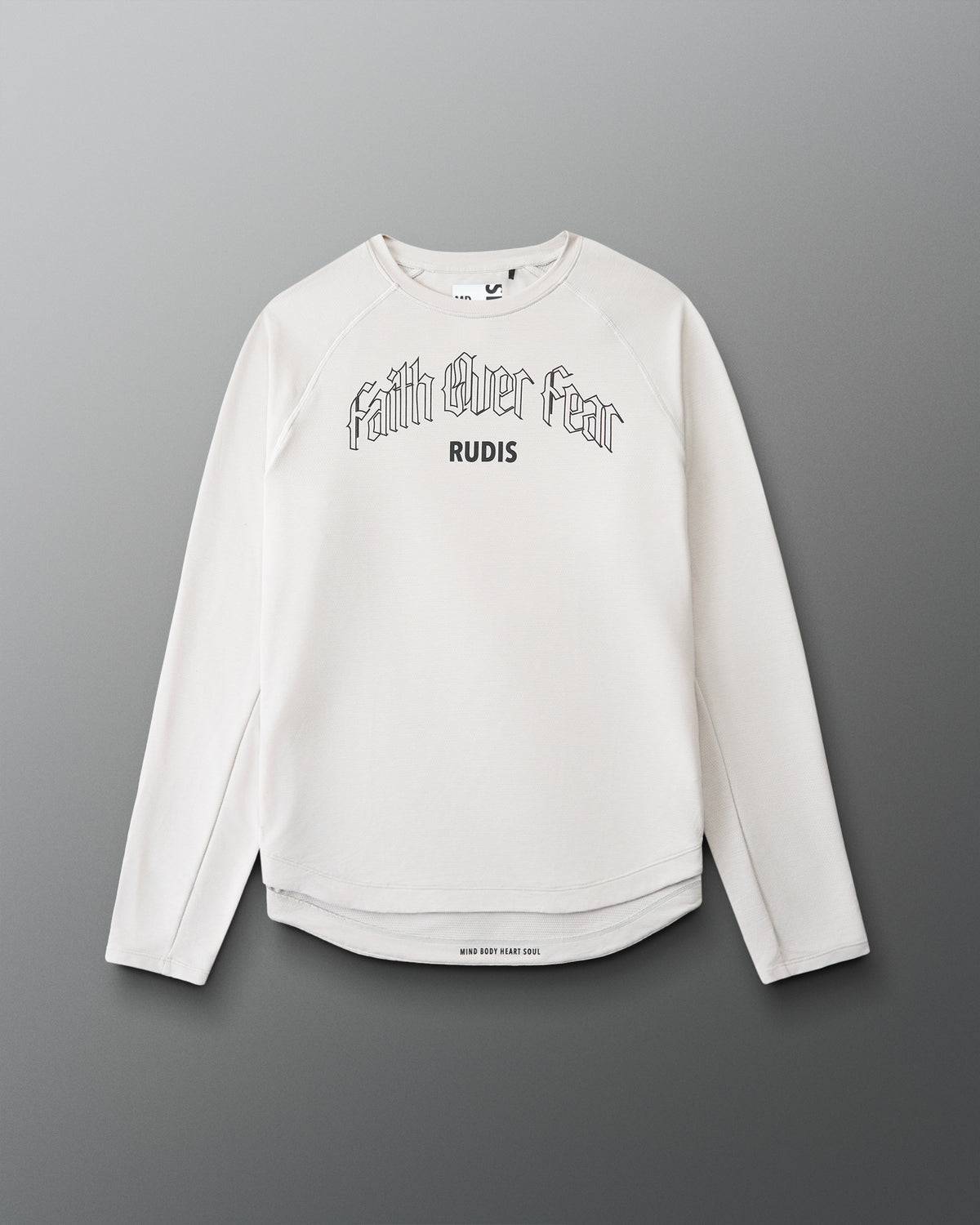 White long-sleeve shirt with 'Faith Over Fear' text on a gray background