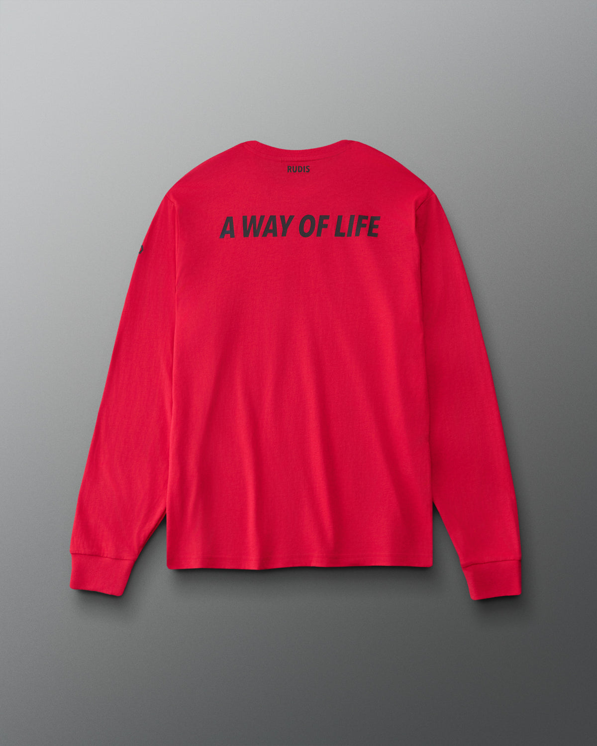 Back view of RUDIS USA Elite Super Soft Long Sleeve Shirt in red, featuring black A WAY OF LIFE lettering across the upper back, RUDIS branding below the collar, and ribbed cuffs.