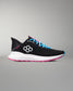Black running shoe with blue laces and pink sole on a gray background