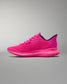 Pink athletic shoe on a gray background
