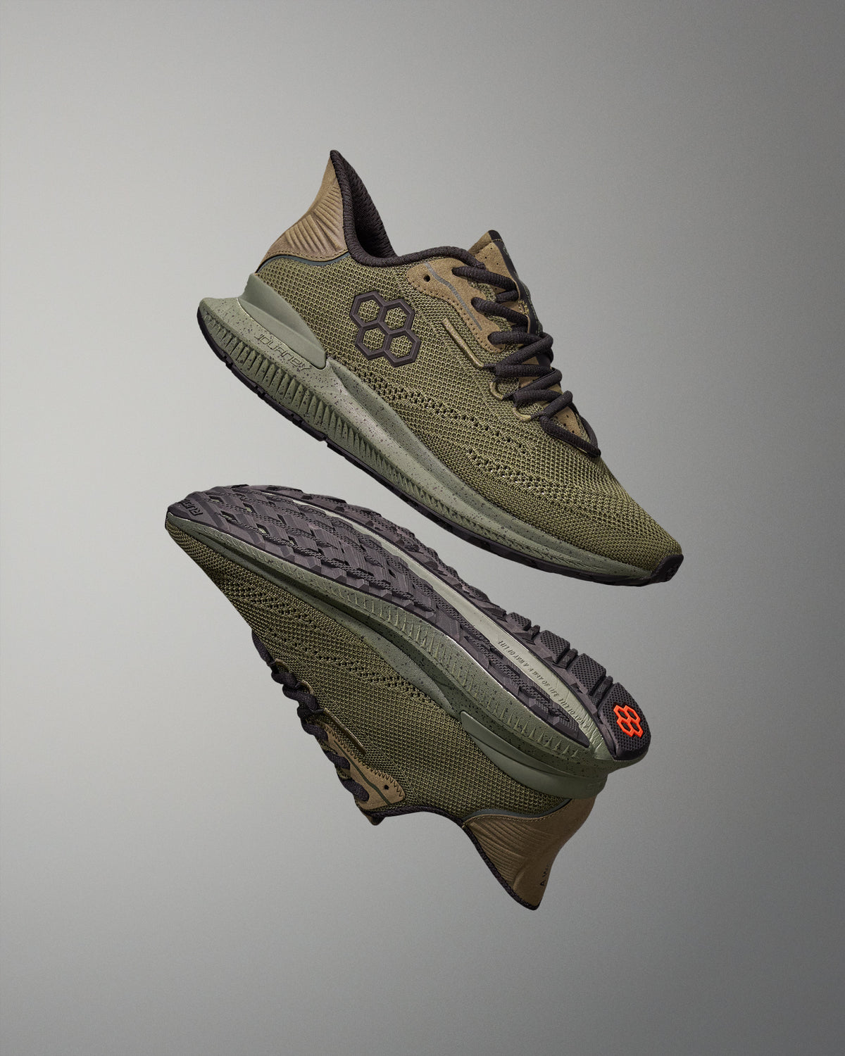 Pair of green training shoes on a gray background