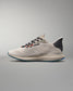 White running shoe with black and blue accents on a gray background