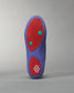 A vibrant purple shoe sole featuring red accents and textured grips designed for optimal traction