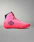 Pink wrestling shoe with black sole on a gray background