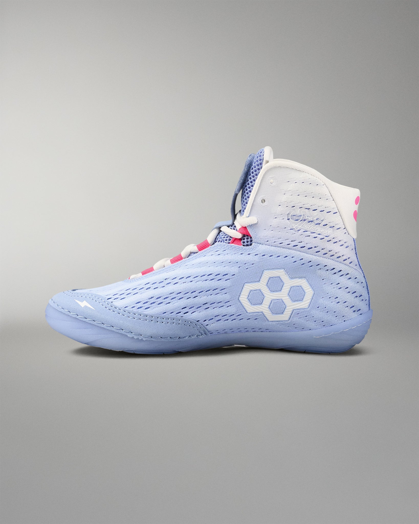 Blue wrestling shoe with a RUDIS brand logo on a gray background