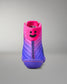 Pink and purple wrestling shoe with a smiley face design on a gray background