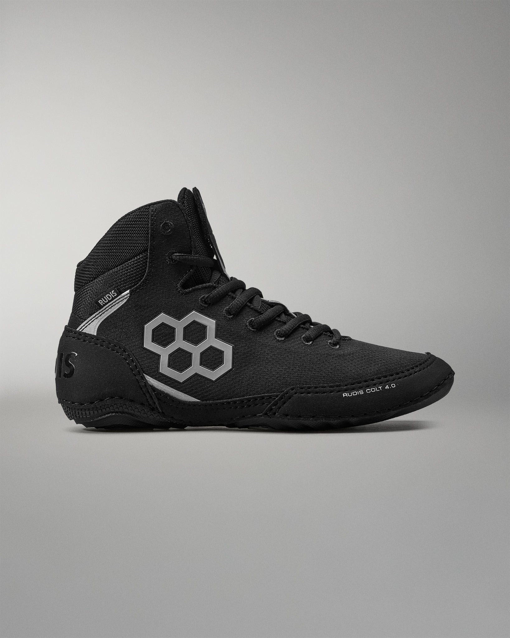 Black Wrestling shoe with a white logo on a gray background