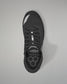 Black Wrestling shoe with a unique sole design on a gray background