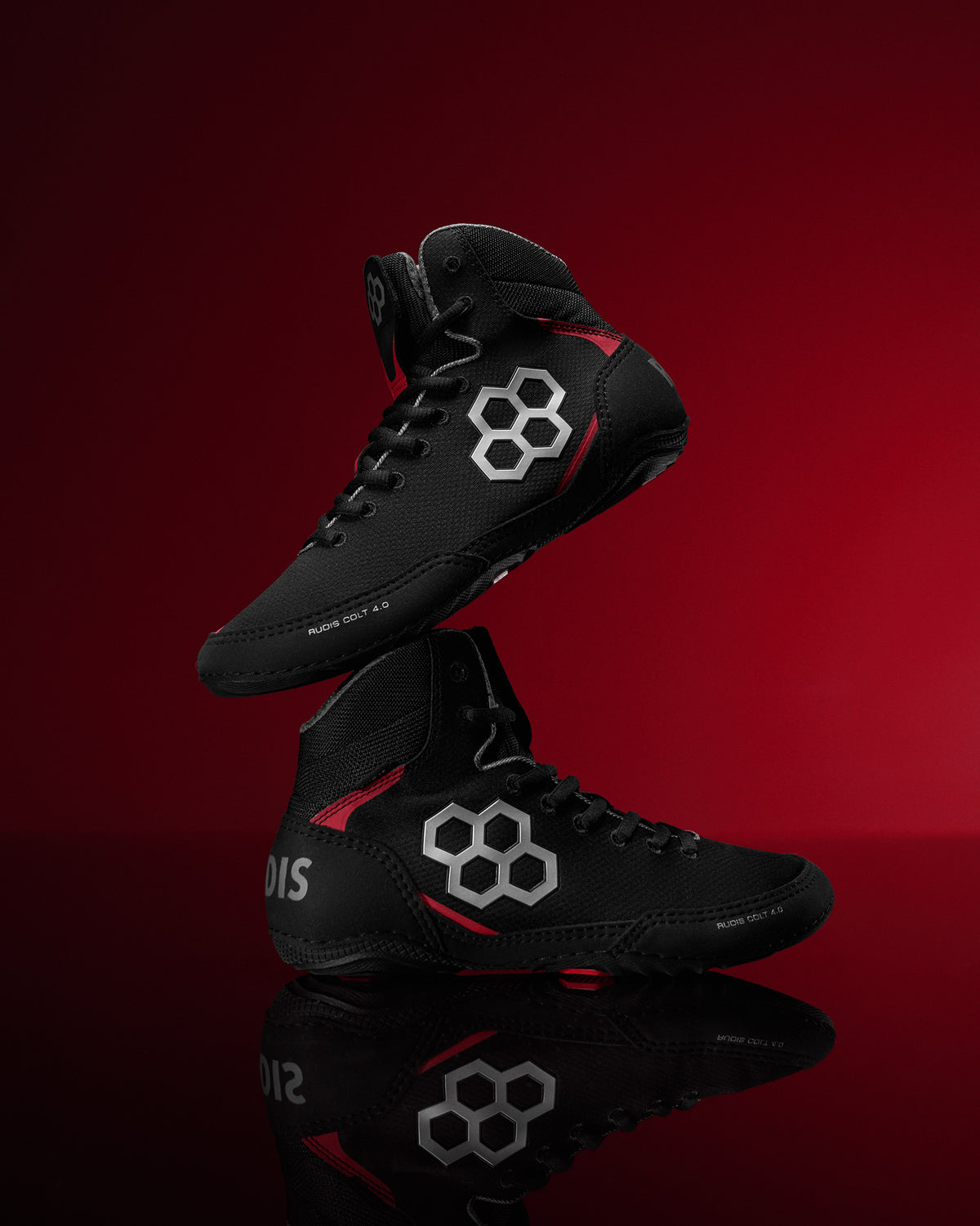 RUDIS Colt 4.0 Live Wire wrestling shoes in black with red accents, a core high-performance shoe engineered for speed, grip, and durability — built to make fast become faster.