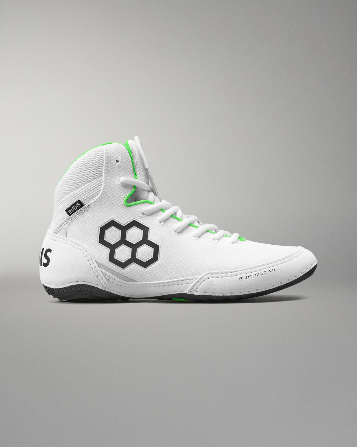 White  wrestling shoes with black hexagonal logo on a gray background