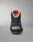 Black wrestling shoe with 'RUDIS' branding on a gray background