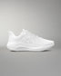 White athletic shoe on a gray background