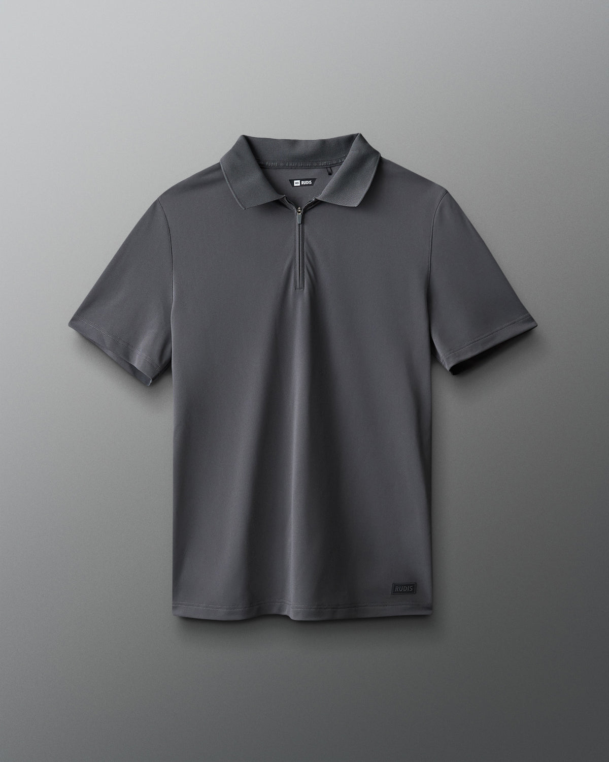 Gray polo shirt with a logo on a gray background