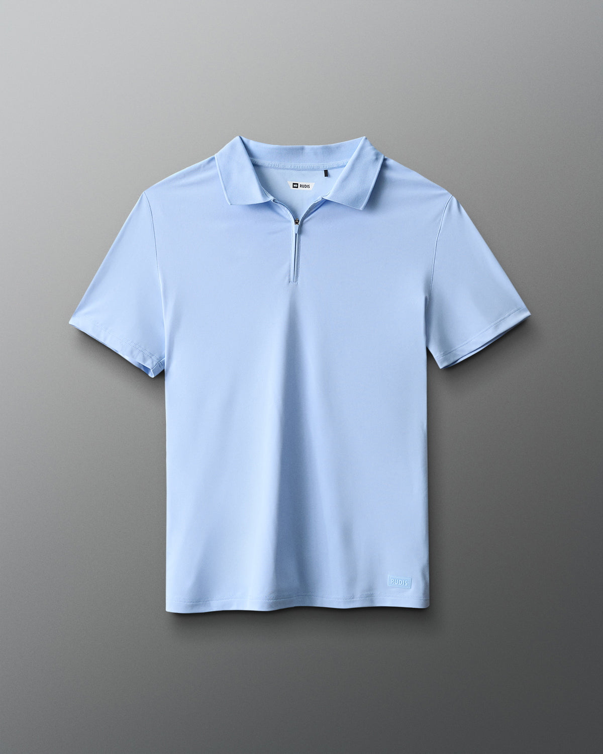 Polo zippé en piqué extensible RUDIS