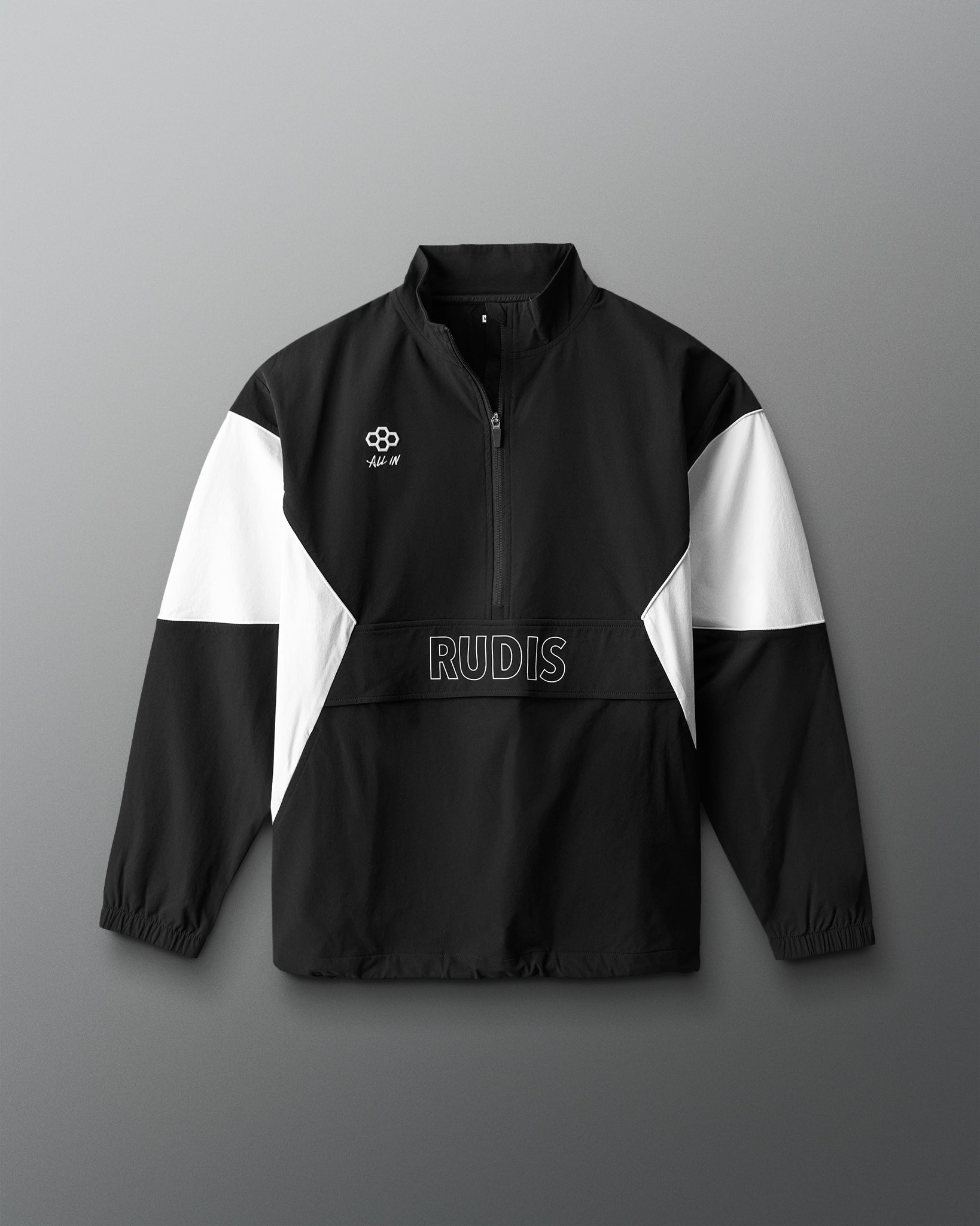 Black and white jacket with 'RUDIS' branding on a gray background