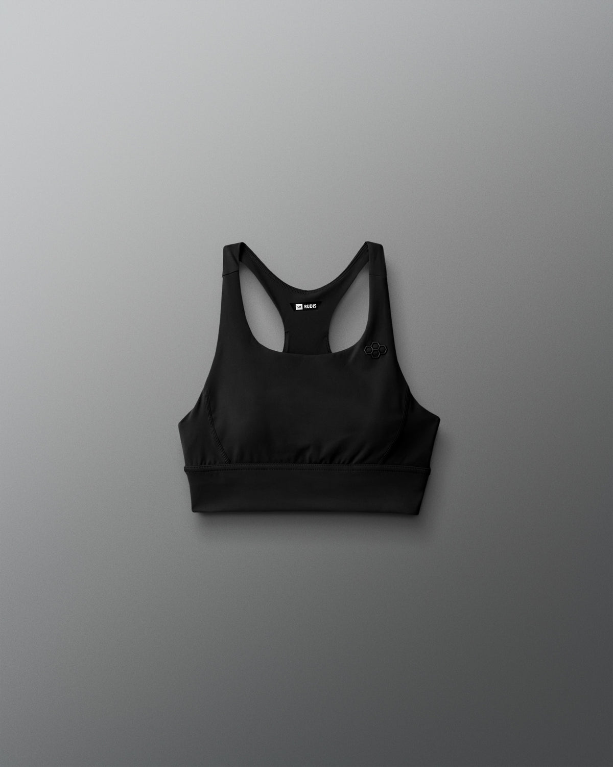 Black sports bra on a gray background