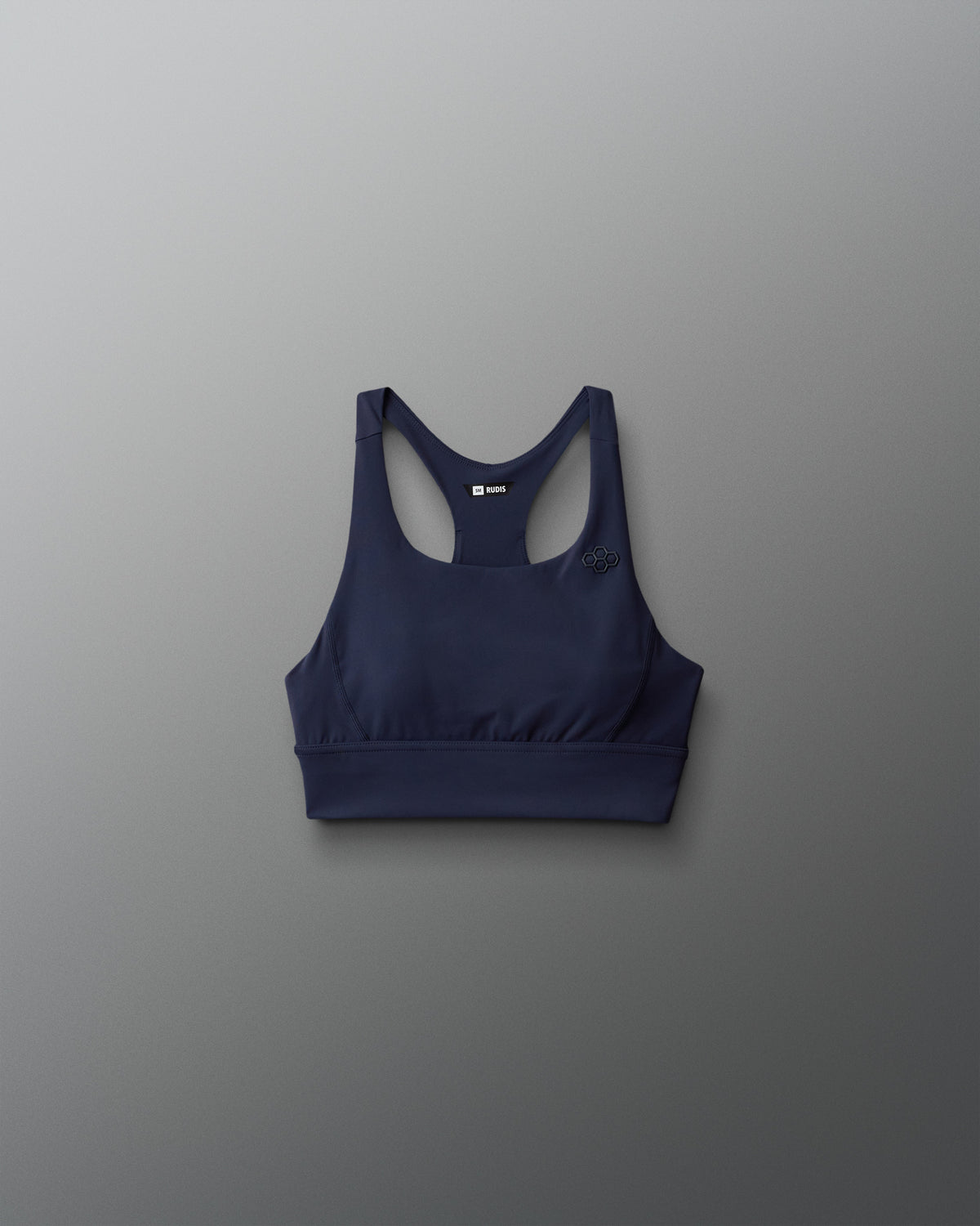 Navy blue sports bra on a gray background