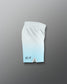 Gradient shorts transitioning from white to light blue on a gray background
