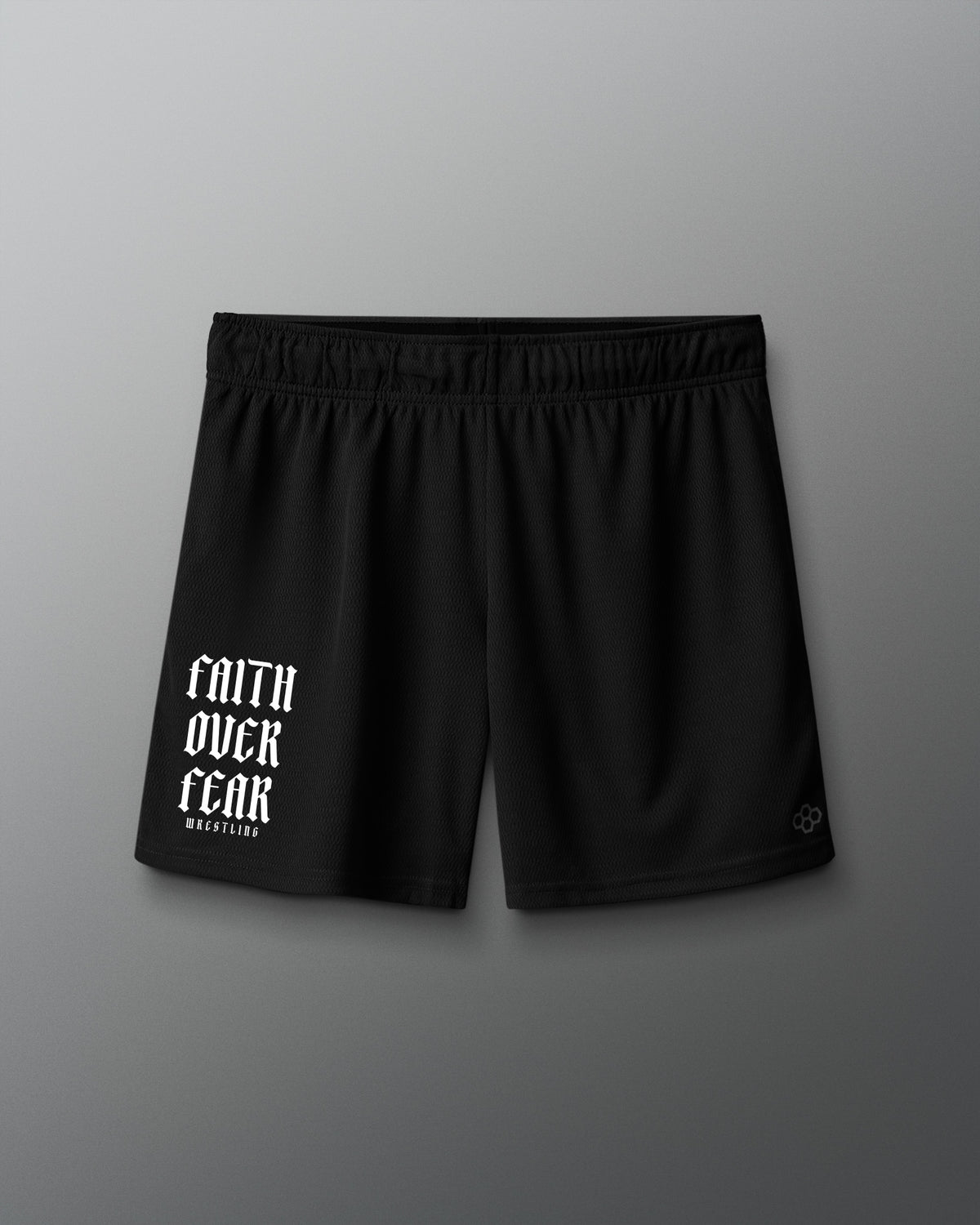 Black shorts with 'Faith Over Fear' text on a gray background