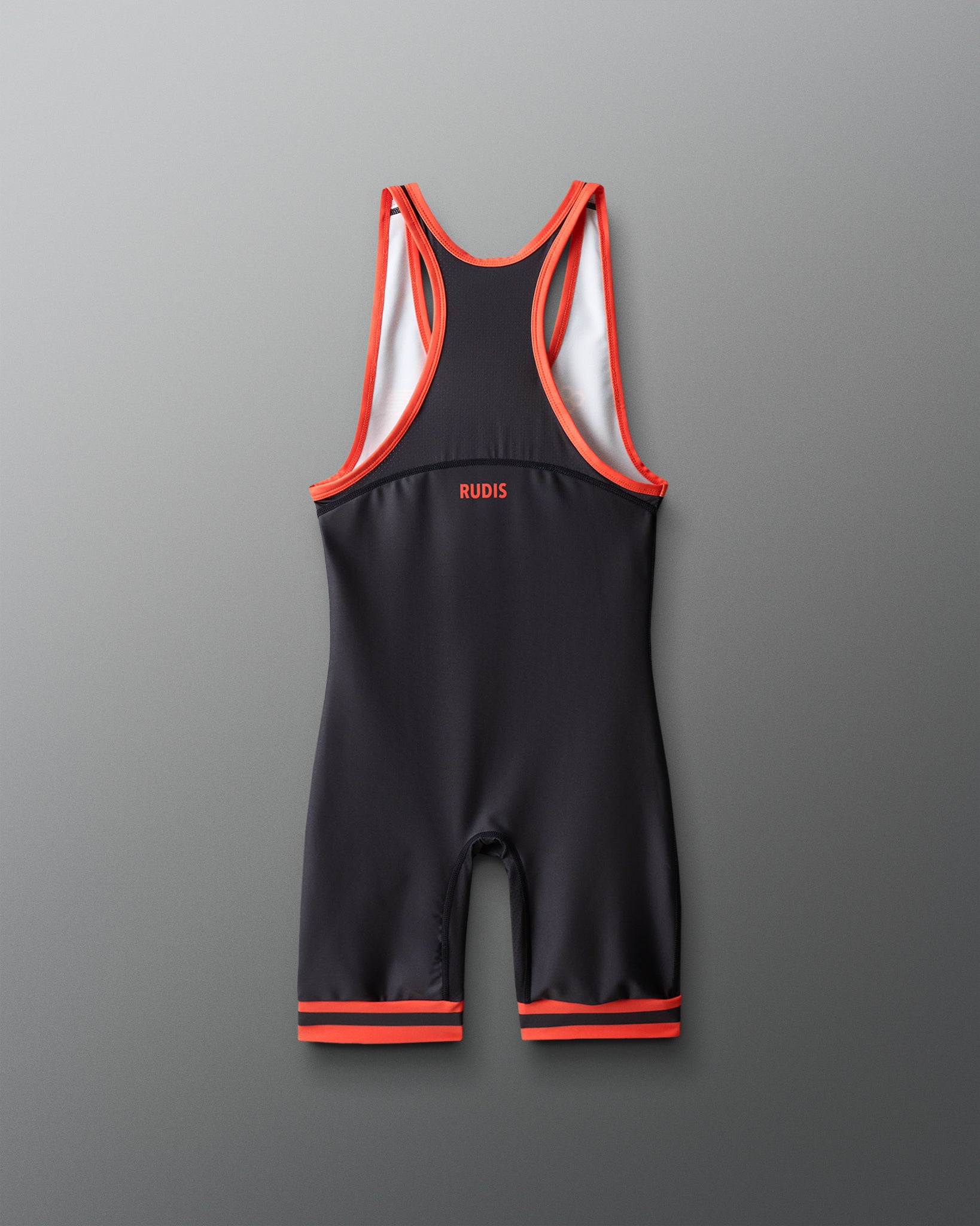 Black and red wrestling singlet on a gray background