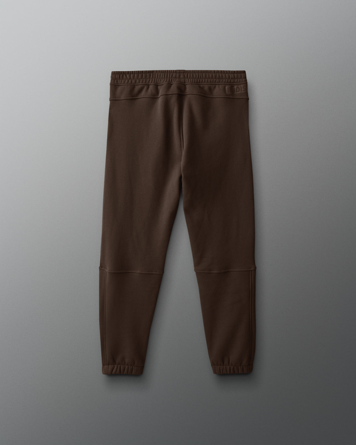 Brown pants on a gray background