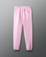 Pink sweatpants on a gray background