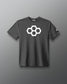 A gray t-shirt with a white quadhex graphic design on the front and a smaller hexagonal logo on the left sleeve.